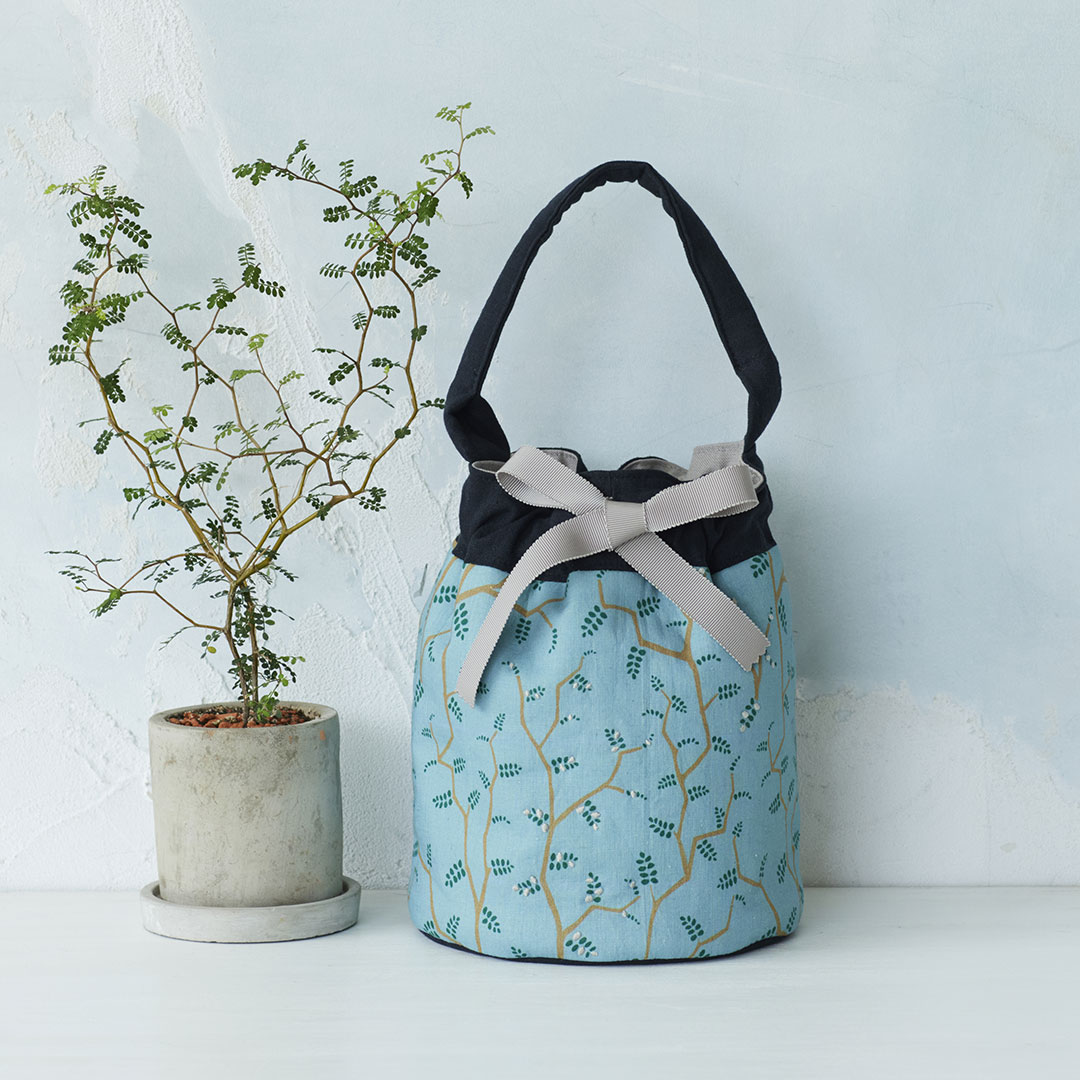 fabrica uka オリジナルファブリックの巾着バッグ「little baby」