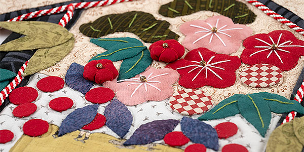 慶び連なり春に賜もの